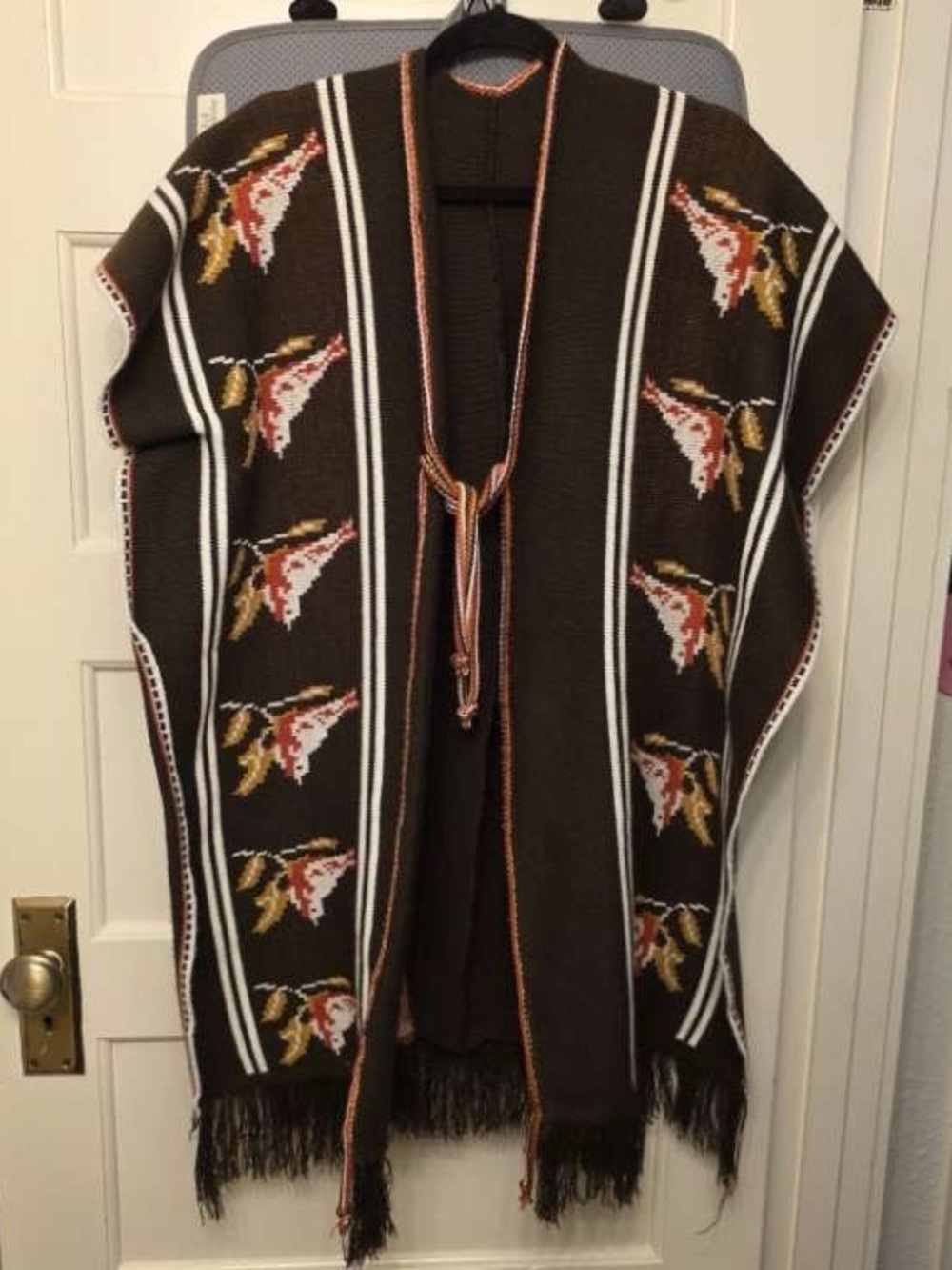 Brown and tan poncho with bird design